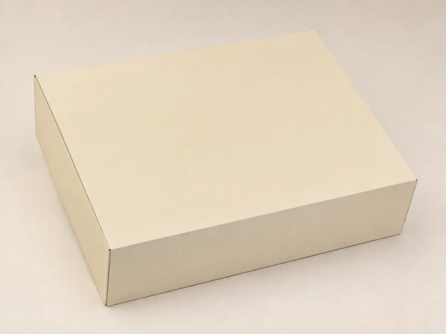 AI packaging illustration: one completely closed unbranded cream fruit gift carton with neat folded edges, three-quarter studio view