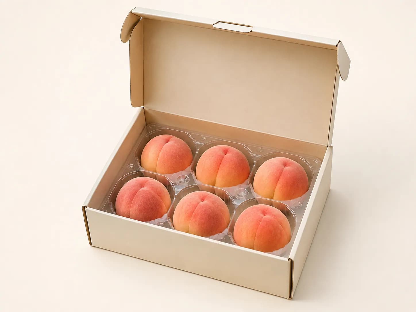 AI packaging illustration: the cream gift carton with its hinged lid opened upward revealing six peaches in a clear six-pocket support tray, high three-quarter view