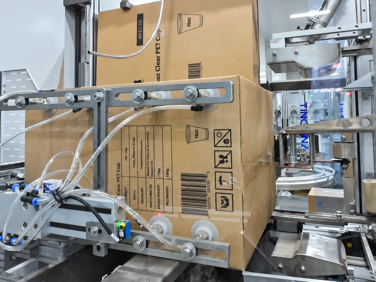 Carton sealing conveyor in the packing area