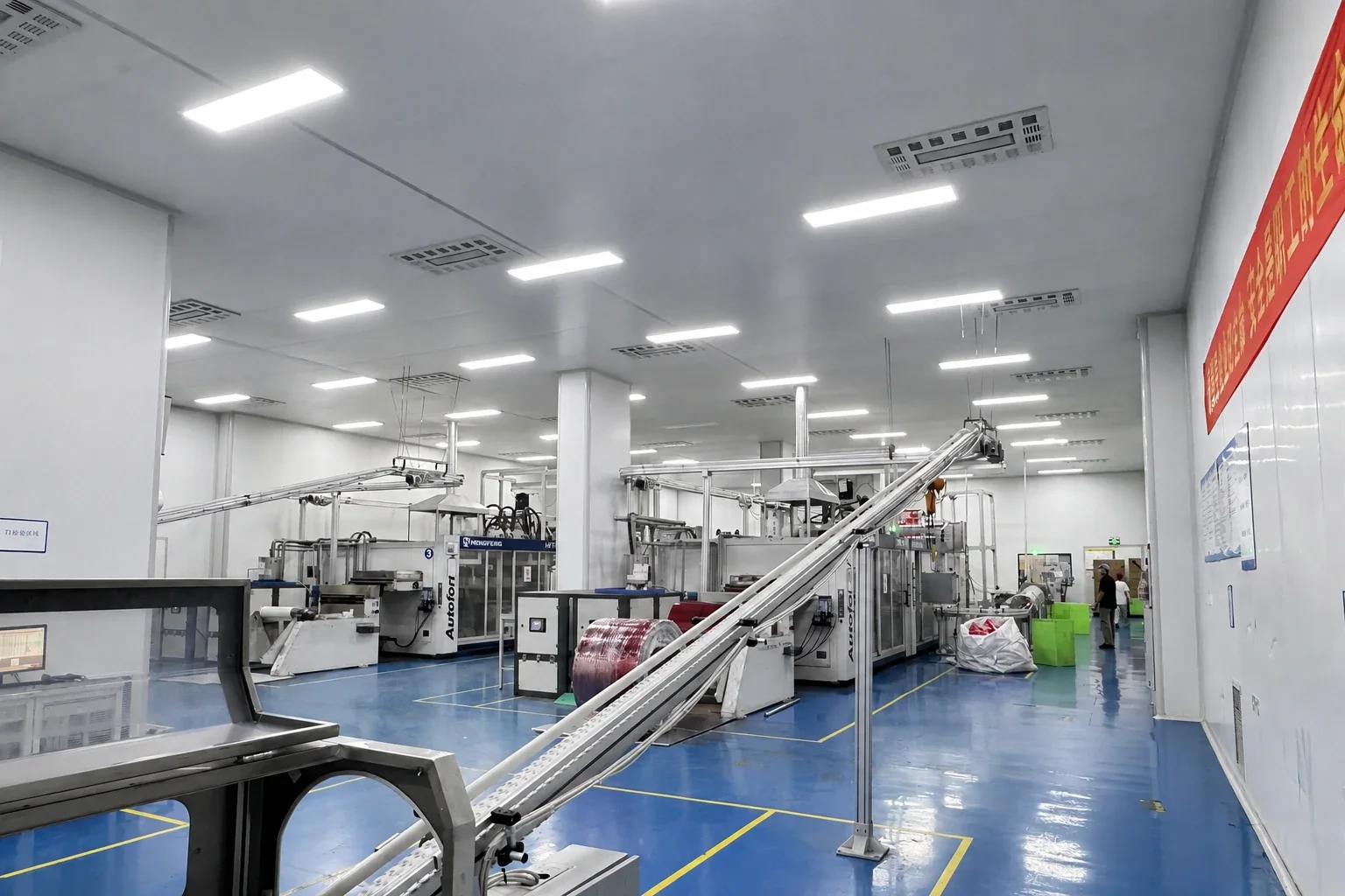 Wide view across the production floor and forming lines