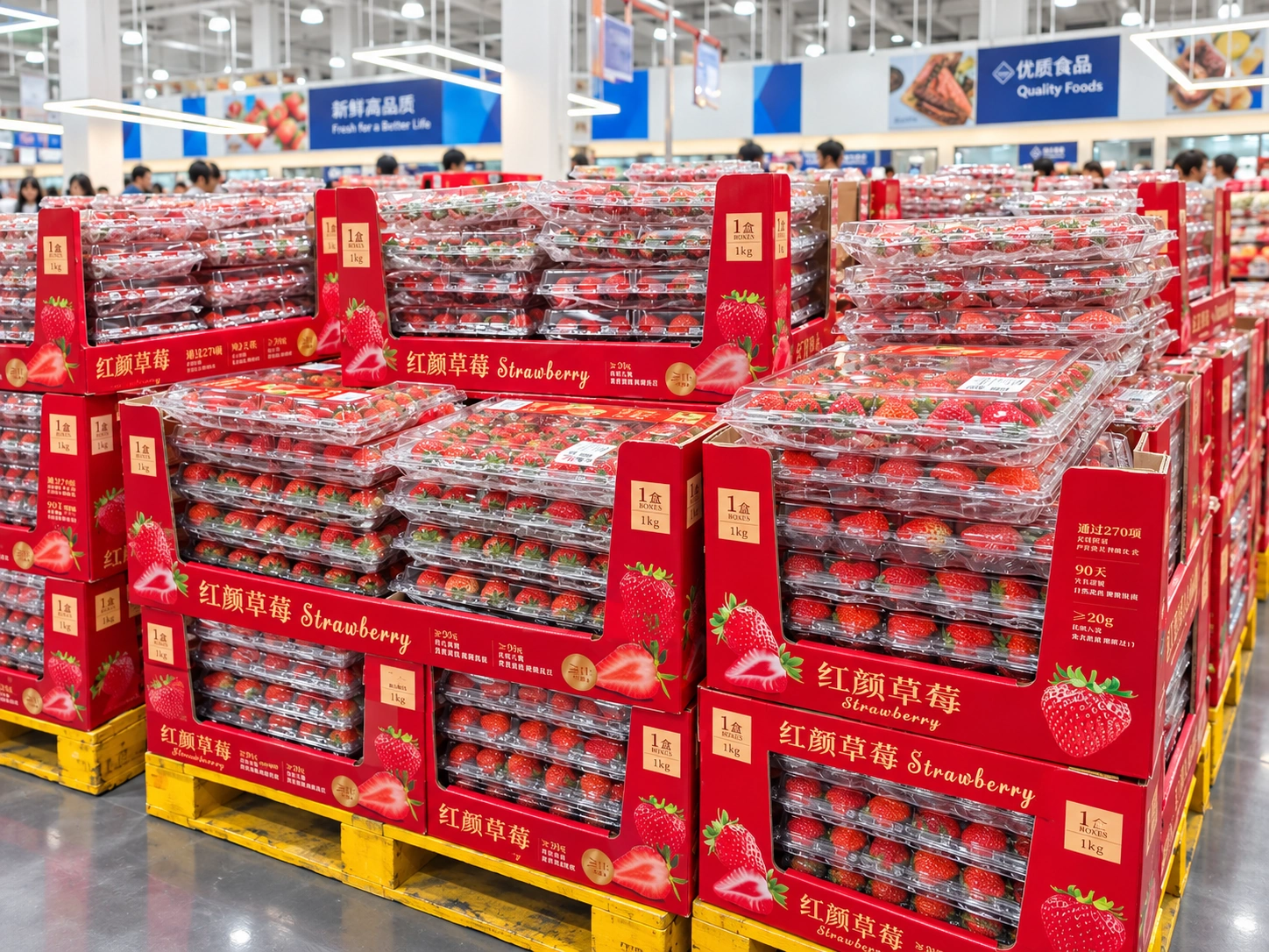 Strawberry clamshells stacked in red retail displays