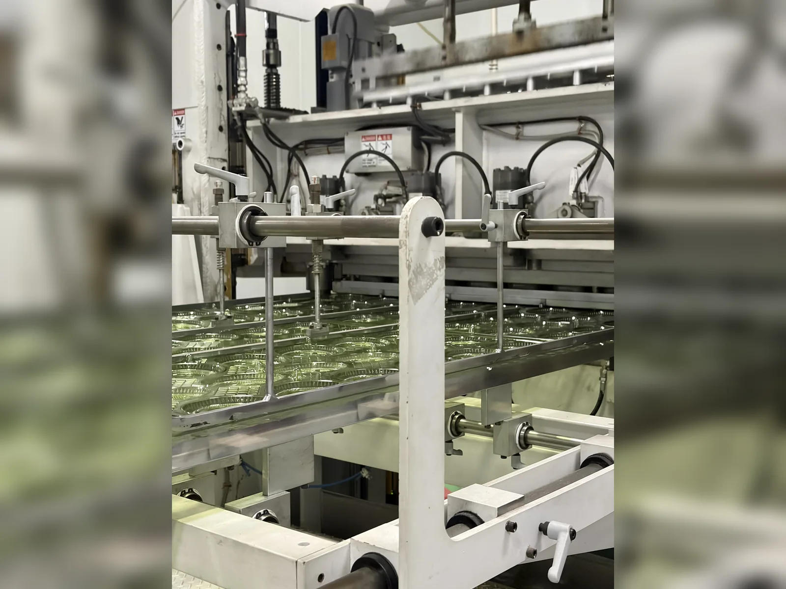 Cup and lid equipment — view 2