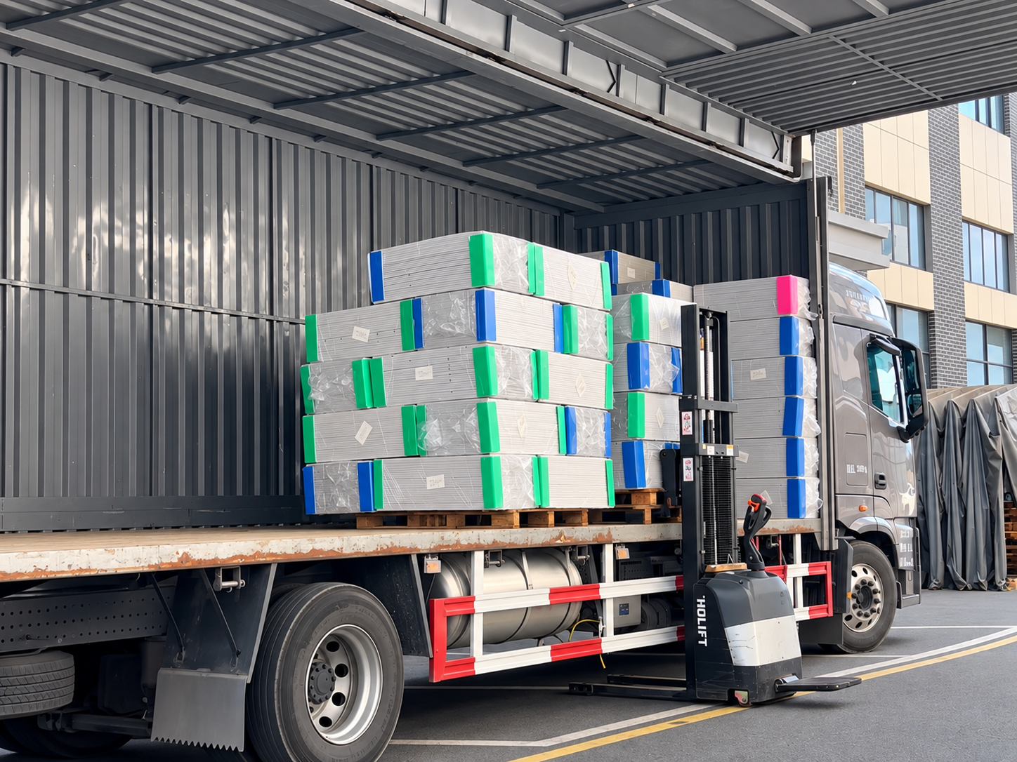 Pallets loaded from the side of a truck